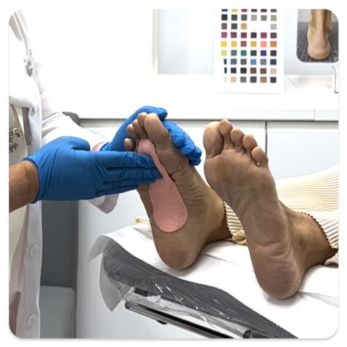 Identify foot corns using Footerella Microscope and use the The Metatarsal Lift and Pull to